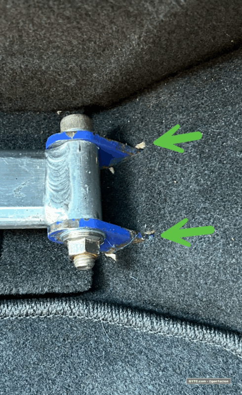 cutting through hatch carpet trim for Greddy rear tower bar install