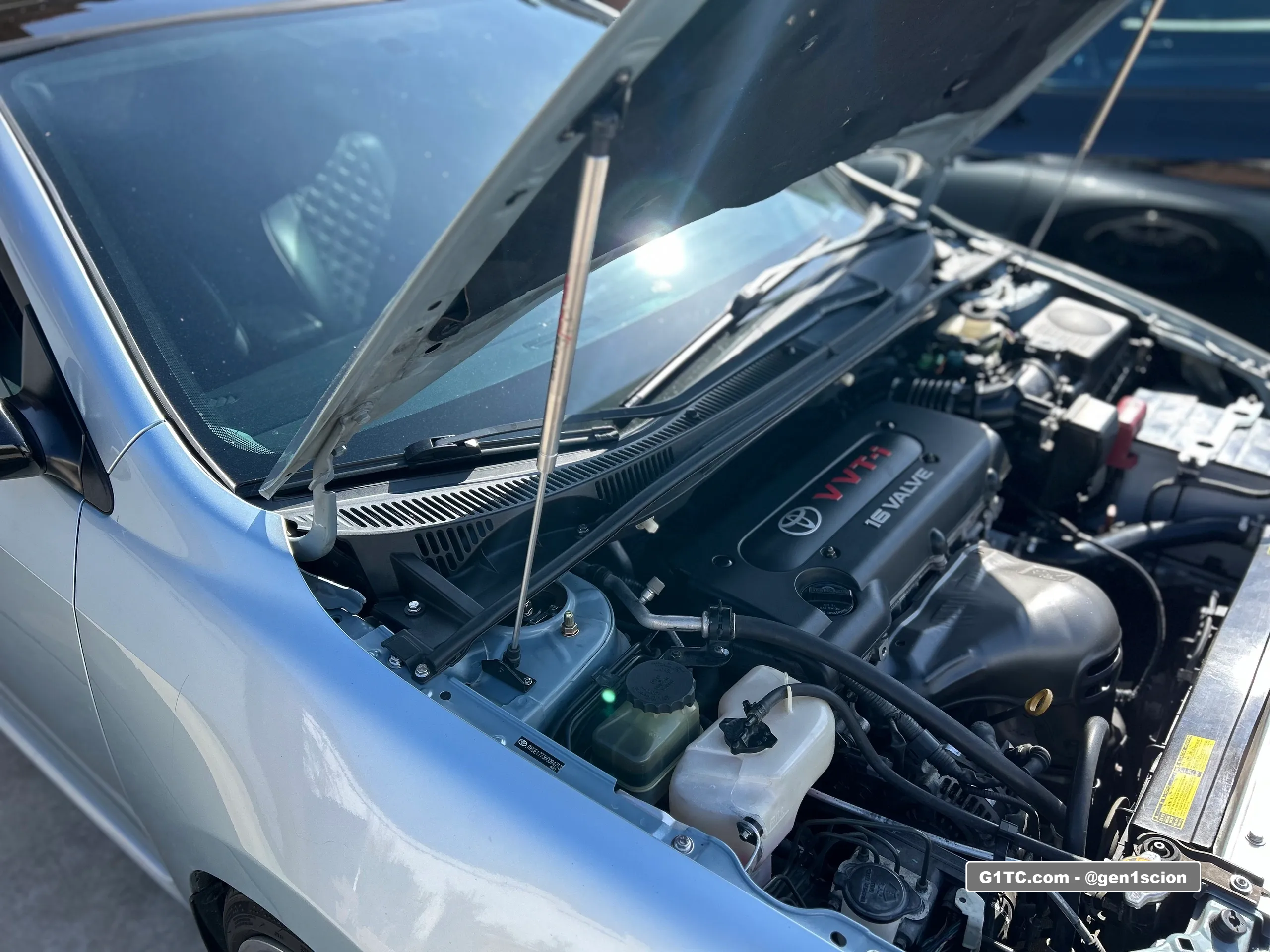 dual redline tuning hood struts installed first gen scion tc