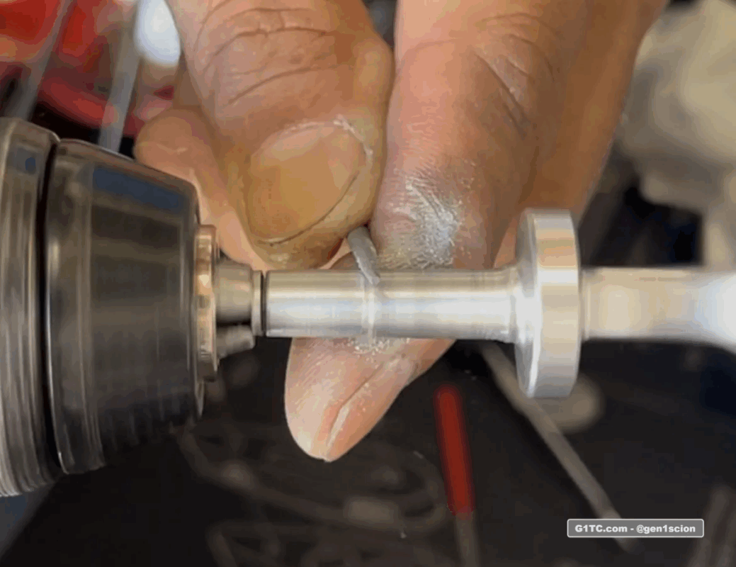 hand cutting the seal channel on the oil dipstick handle