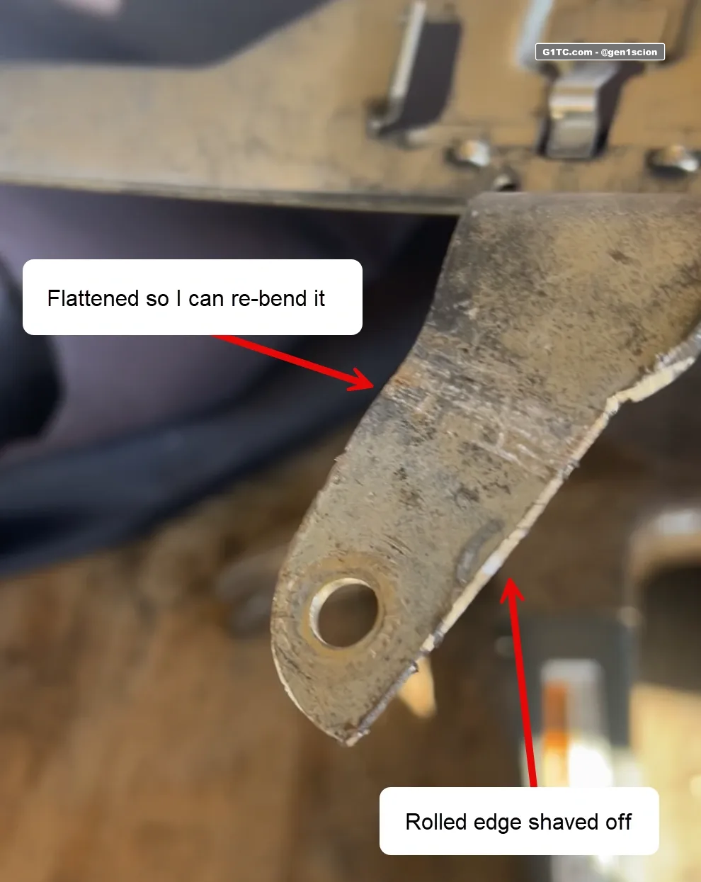 modifying power steering reservoir bracket to make clearance for passenger side hood strut