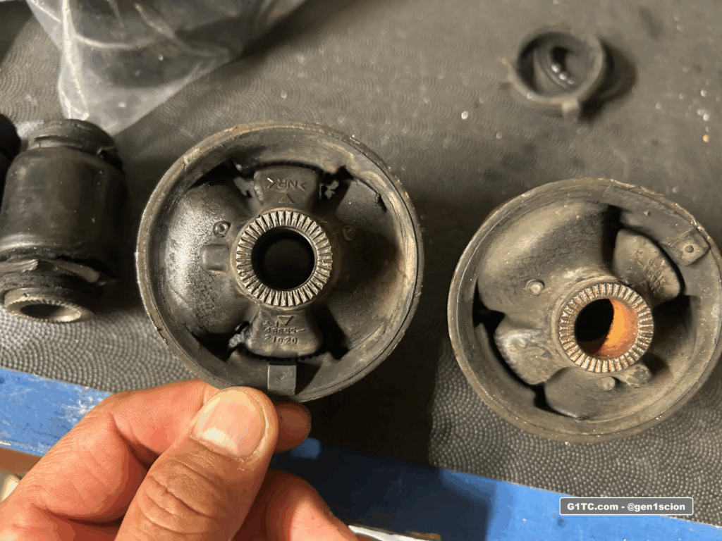 OEM lower front control arm bushings pressed out