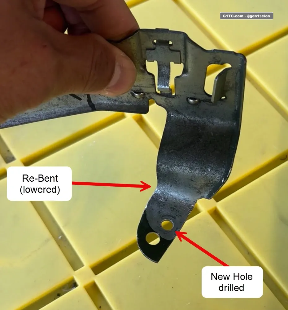 power steering bracket modification for passenger side hood strut clearance