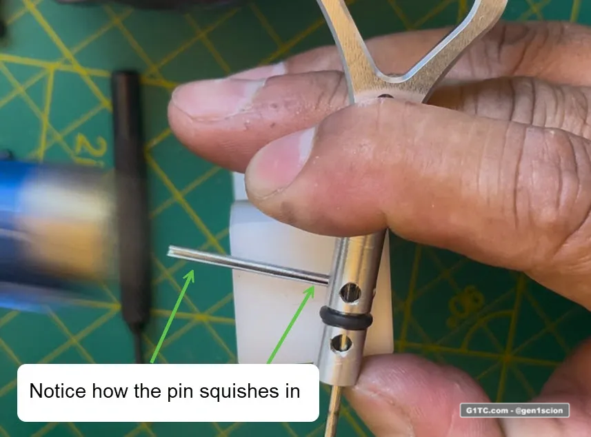 pressing in the roll pin on the custom oil dipstick handle