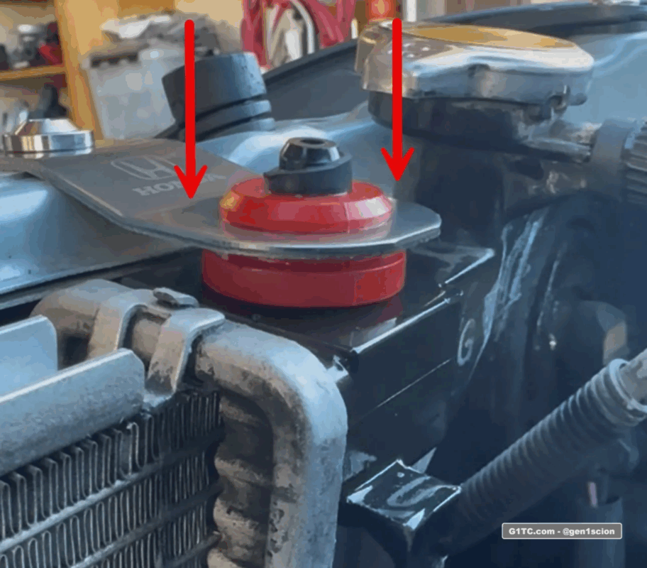 push down on the bracket to make it level w/ the top of the radiator