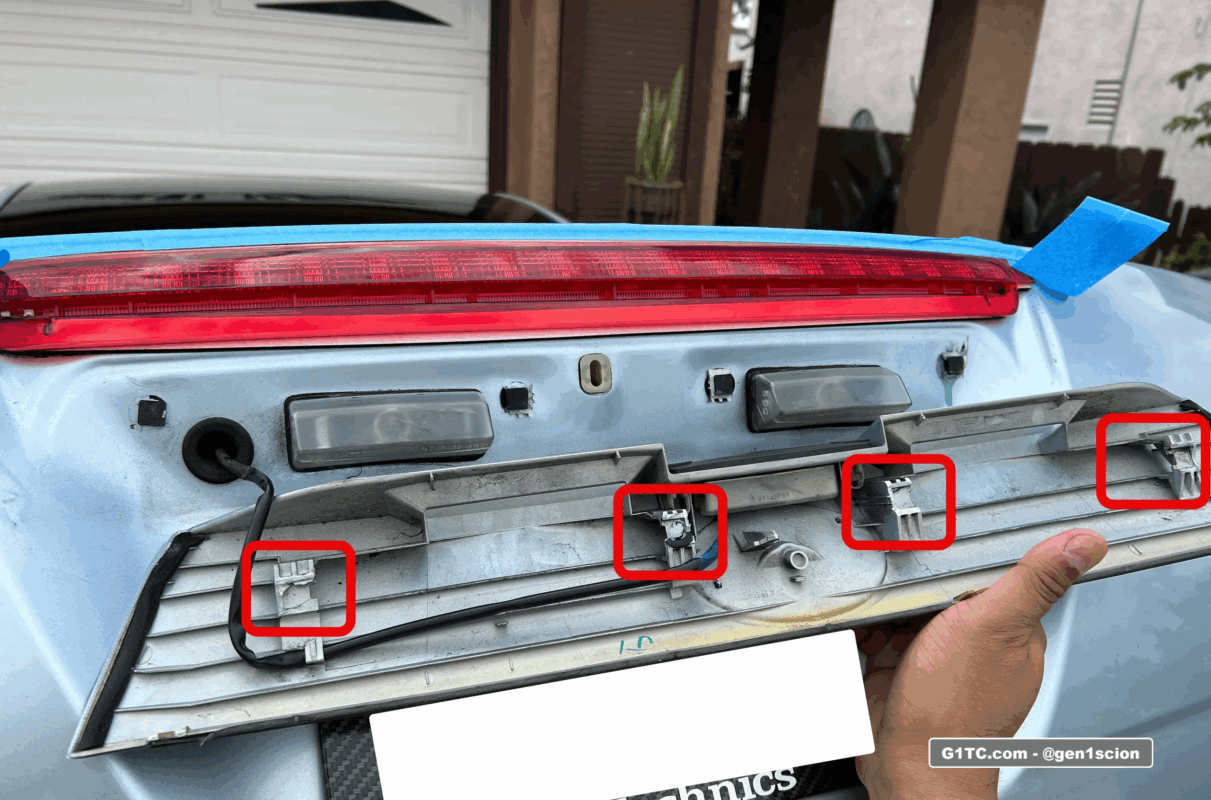 rear hatch garnish plastic completely snapped tabs 1st gen scion tc