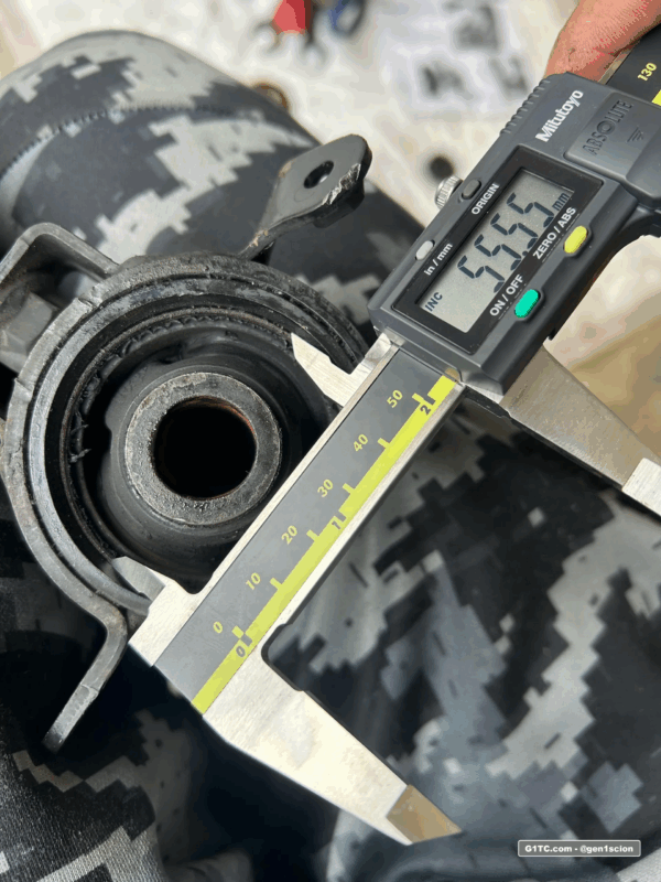 rear training arm bushing measuring the cup