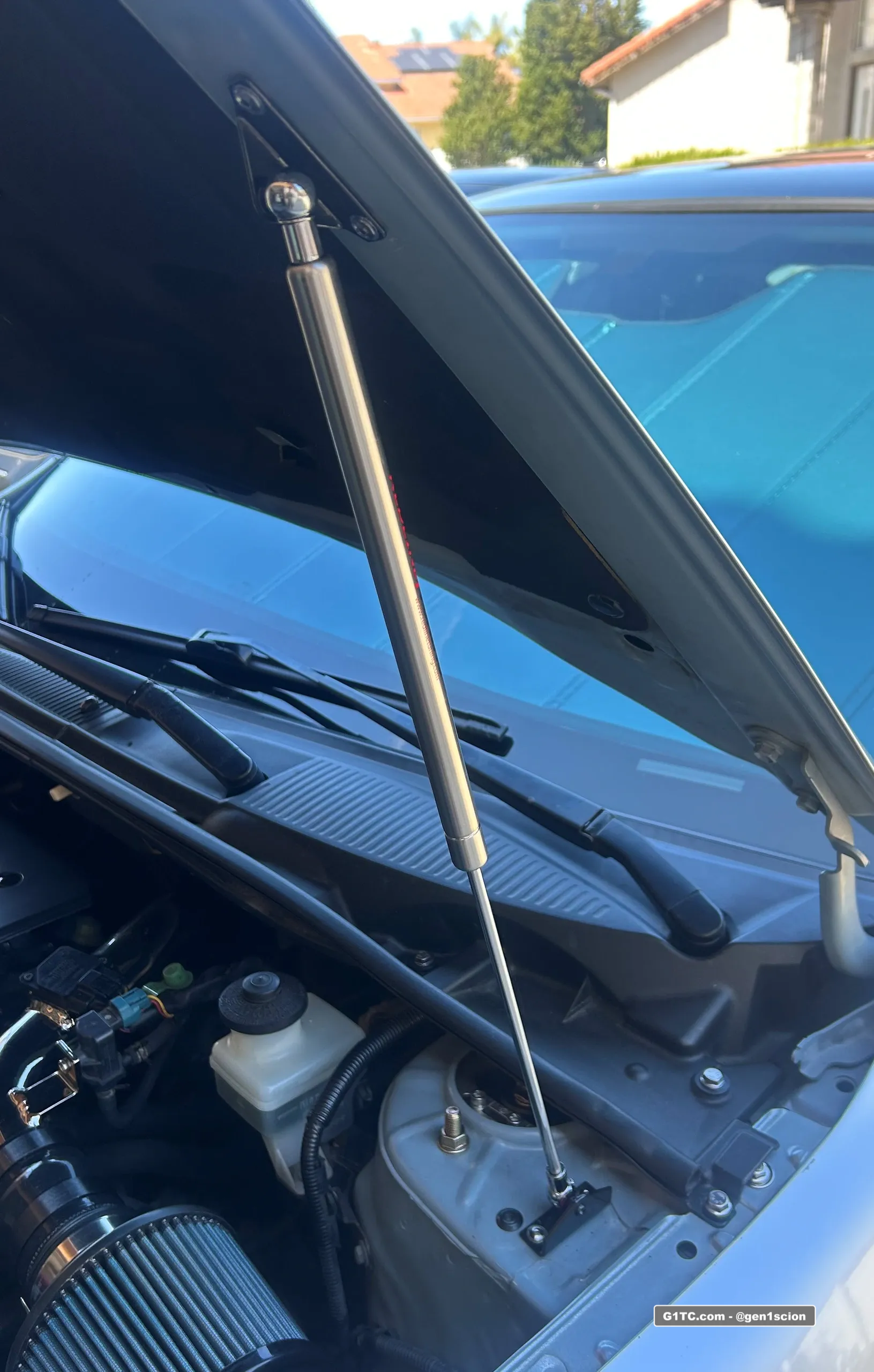 redline tuning hood strut installed driver side