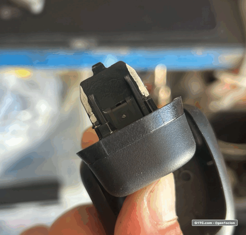removing material from grab handle clip to fit the scion tc