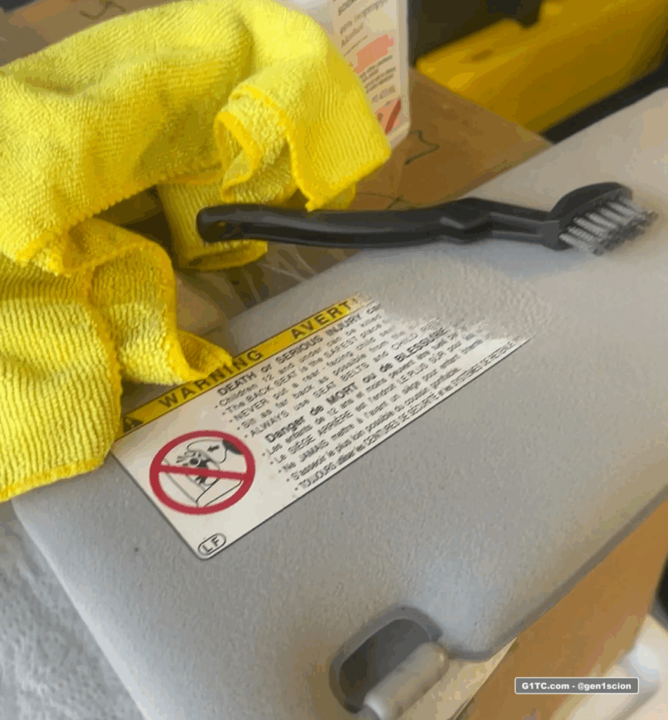 removing the warning label on the OEM sunvisors