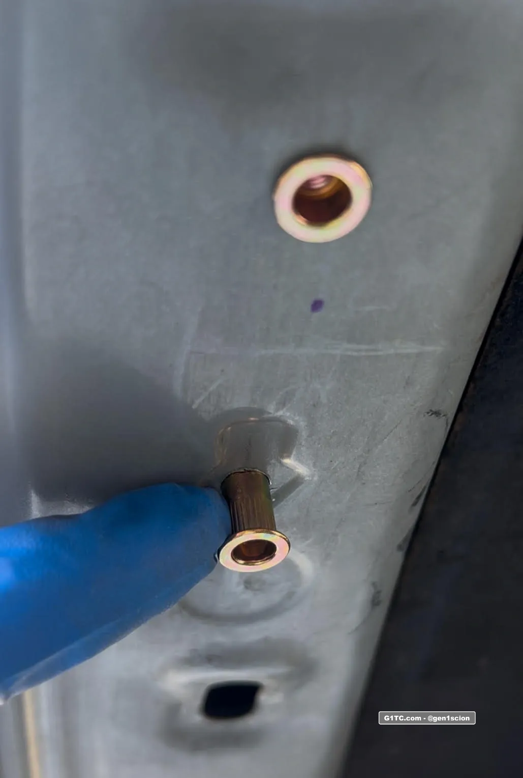 riv nut installed in hood for hood strut installation