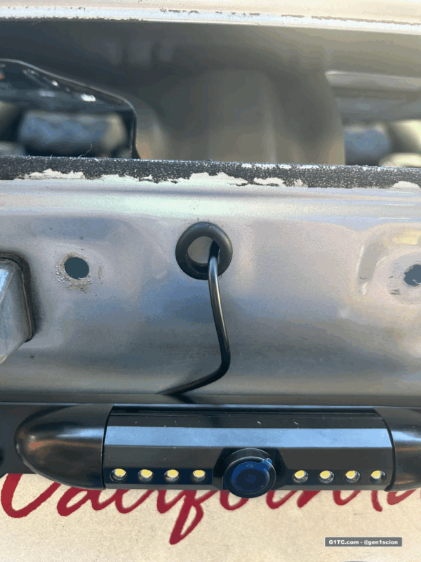 running license plate mount reverse camera wire through hatch hole