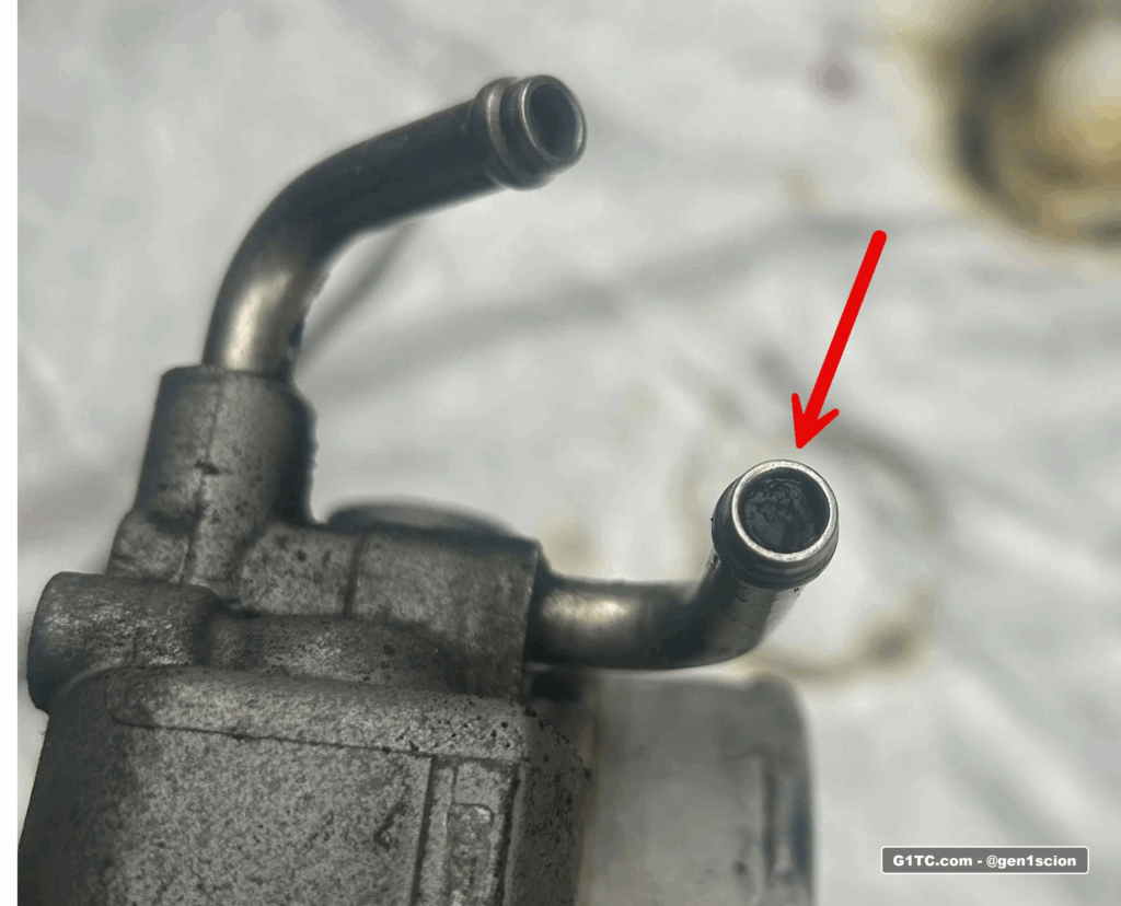 throttle body blockage in coolant pipe
