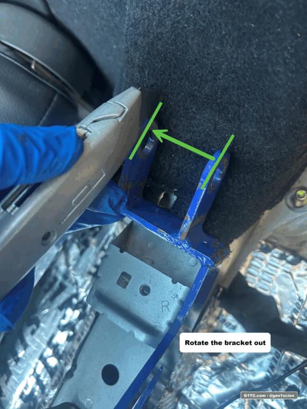 trimming the cloth to install greddy rear strut tower bar bracket