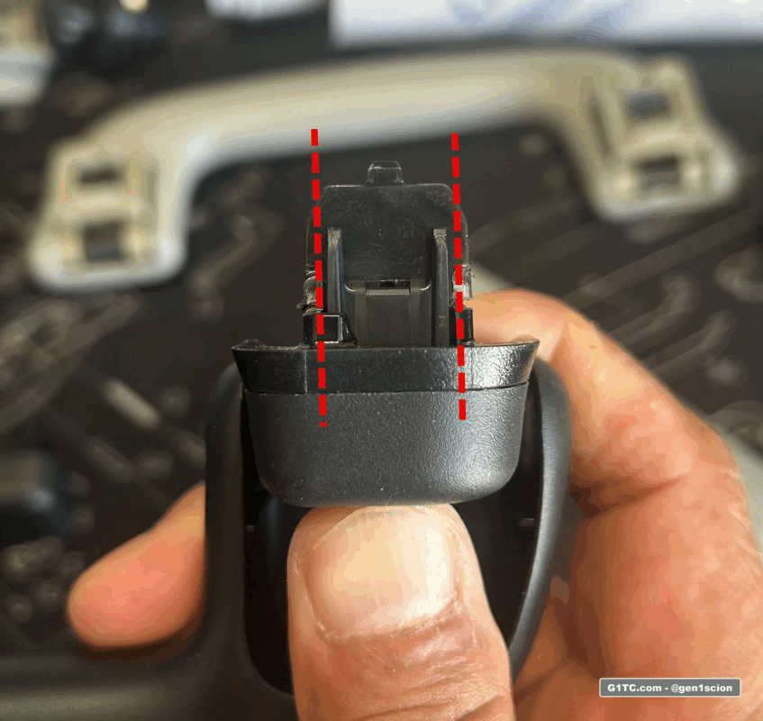 trimming the OEM black toyota grab handle to fit the Scion tC insert