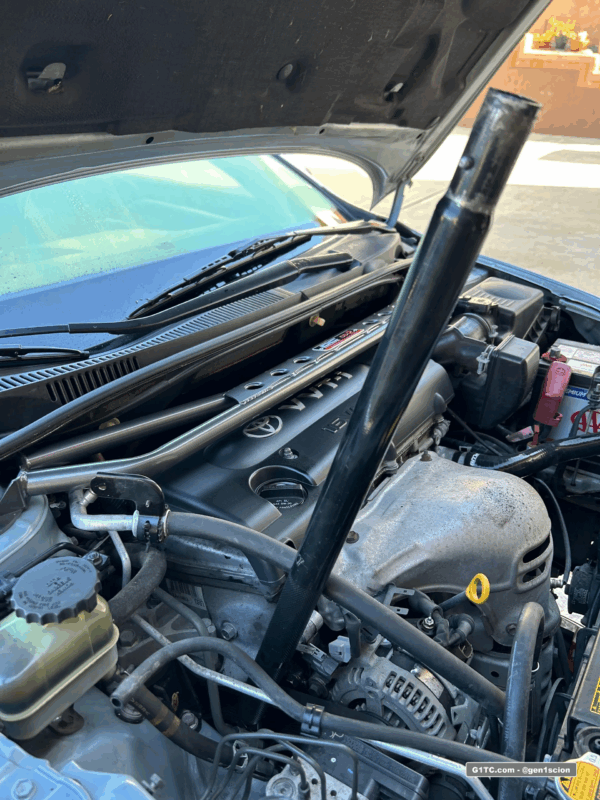 use jack pole as breaker bar for leverage on tensioner bolt