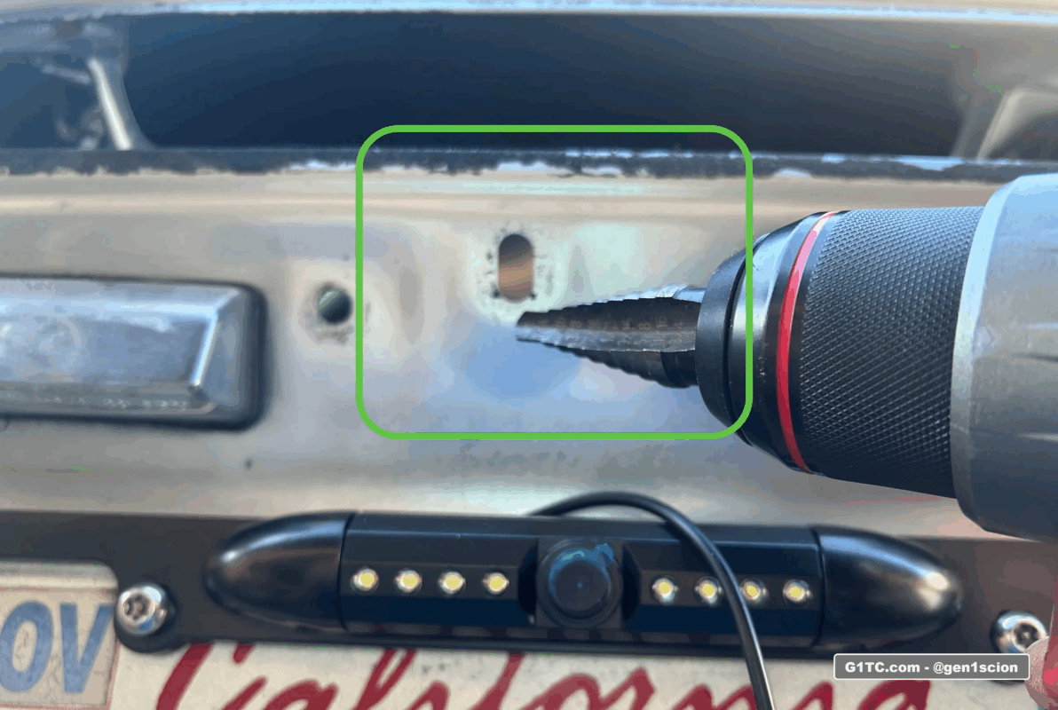 widening hole to feed reverse backup camera wire license plate mount