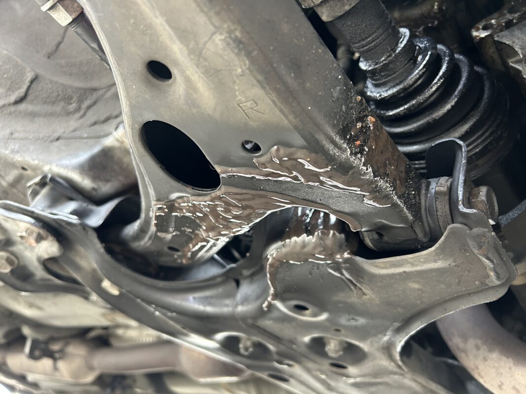 CV Boot crack and grease on lower control arm Scion tc